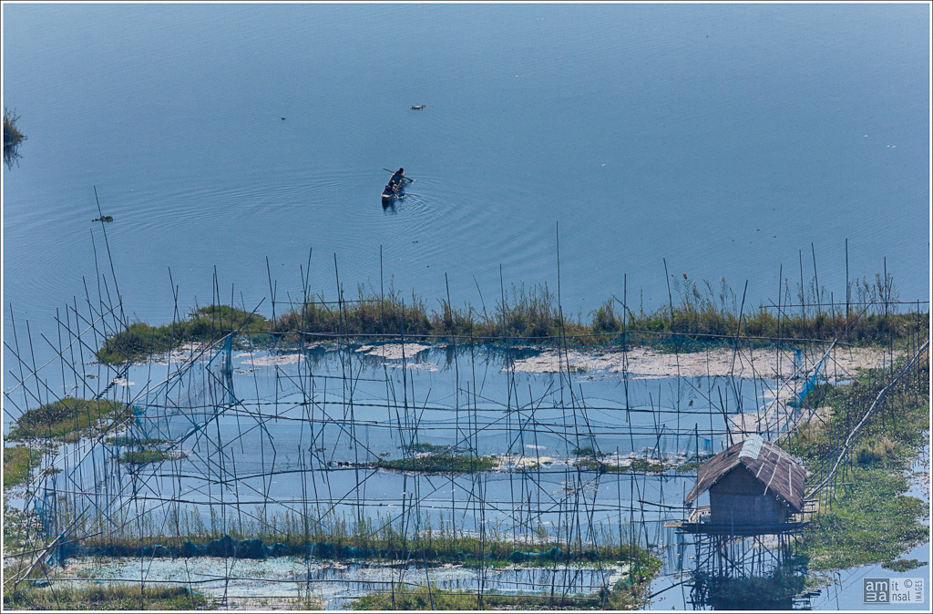 Loktak Lake, the largest freshwater lake in North-East India, is famous for the phumdis (heterogeneous mass of vegetation, soil, and organic matters at various stages of decomposition) of different geometrical shapes floating over it. (Image: Zehawk, Flickr Commons, CC BY-NC-ND 2.0)