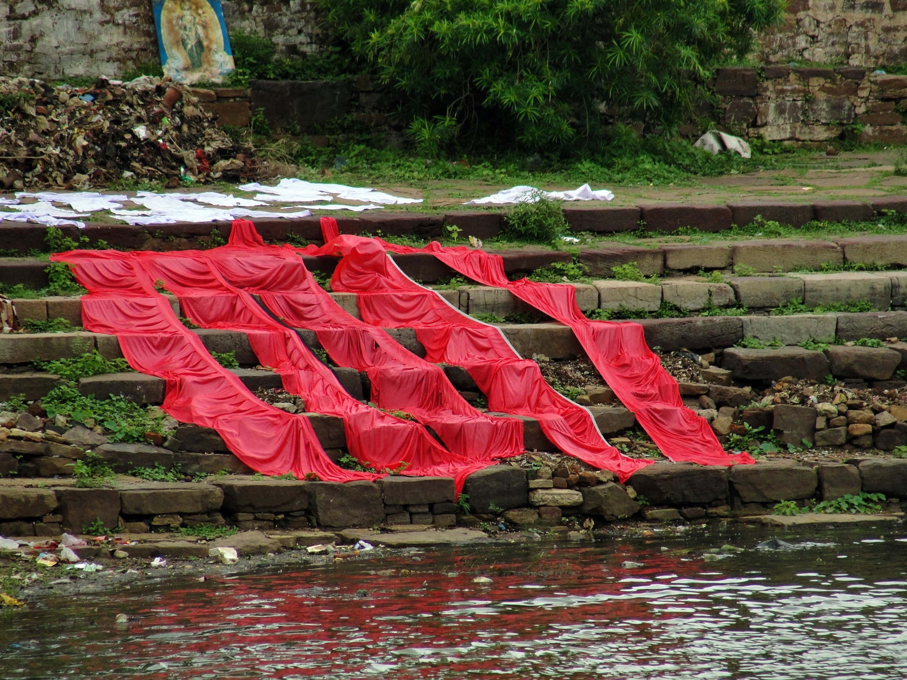 Washed clothes drying on a ghat