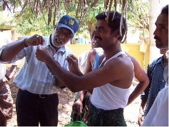 Villagers testing the water themselves