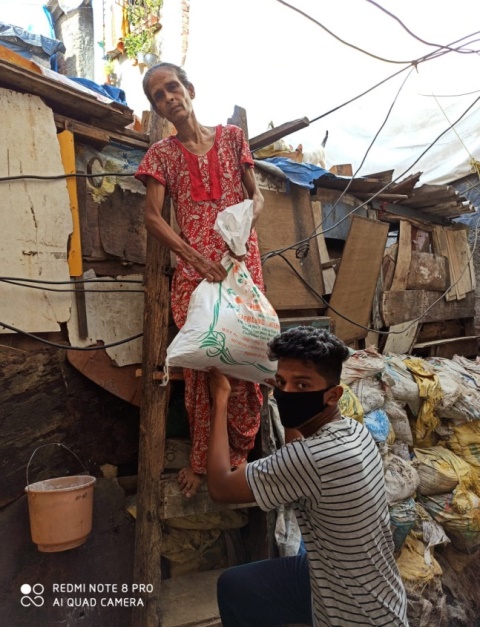 Distributing ration during Covid-19 (Image Source: CACR)