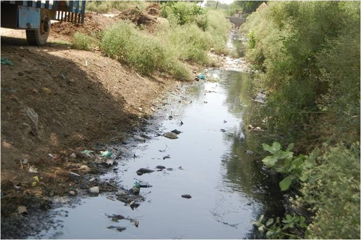 Sewage seen flowing through the drain before restoration.