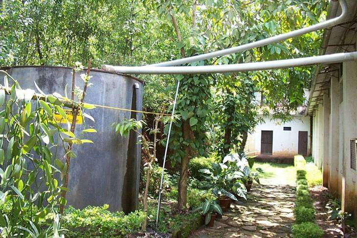 During rainy season, rainwater from the roof of Varanashi industrial shed is collected in a tank and used