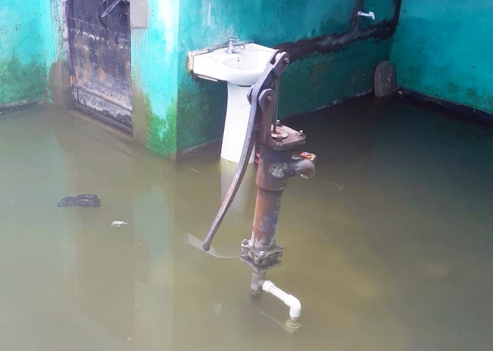 Floodwater enters a house in Chanchalia village 