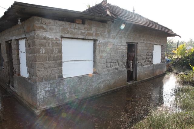 One of the partially submerged houses in Munroe Island.