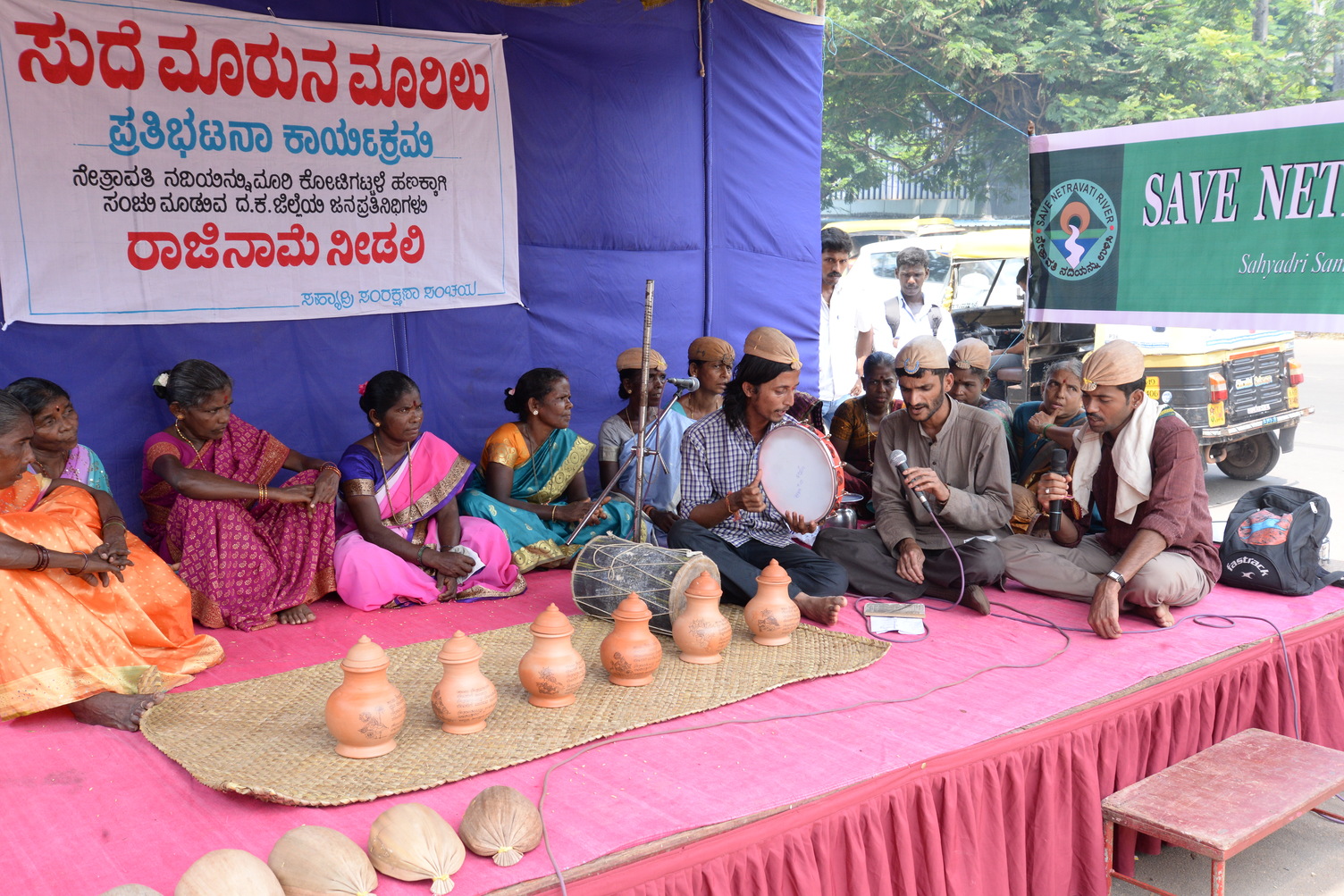 Tribals and fishermen protest the project.