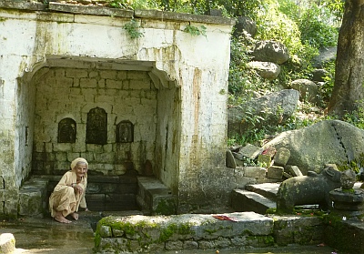 Woman sitting at a naula