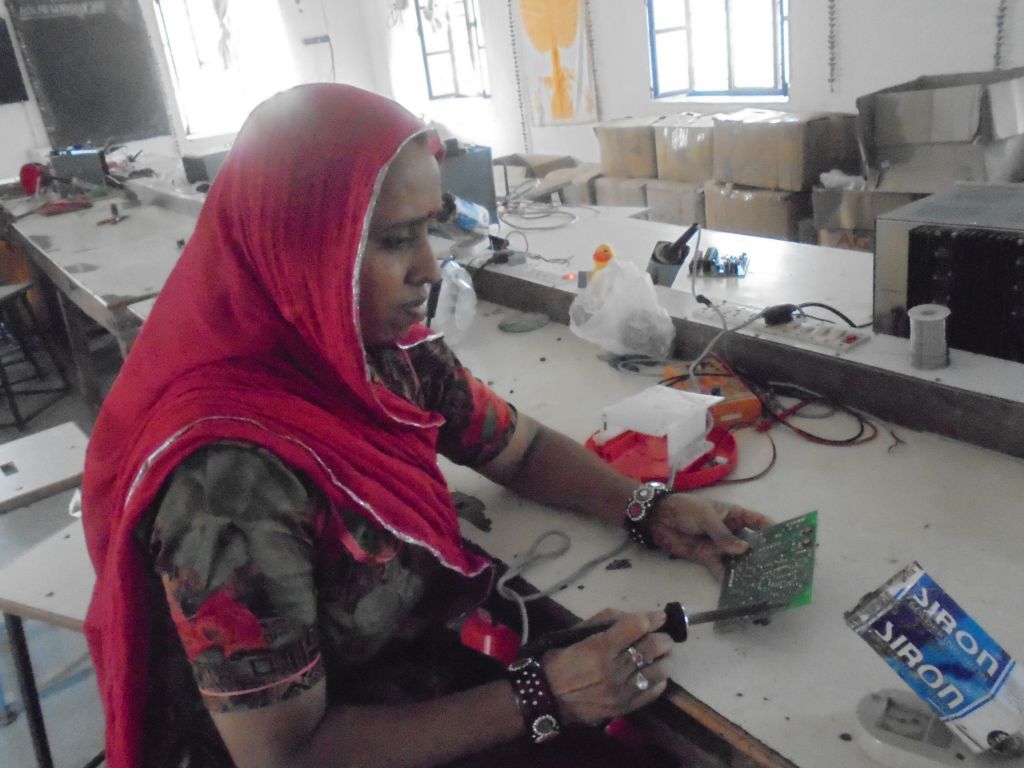 Sita coordinates the work of the barefoot solar cooker engineers.