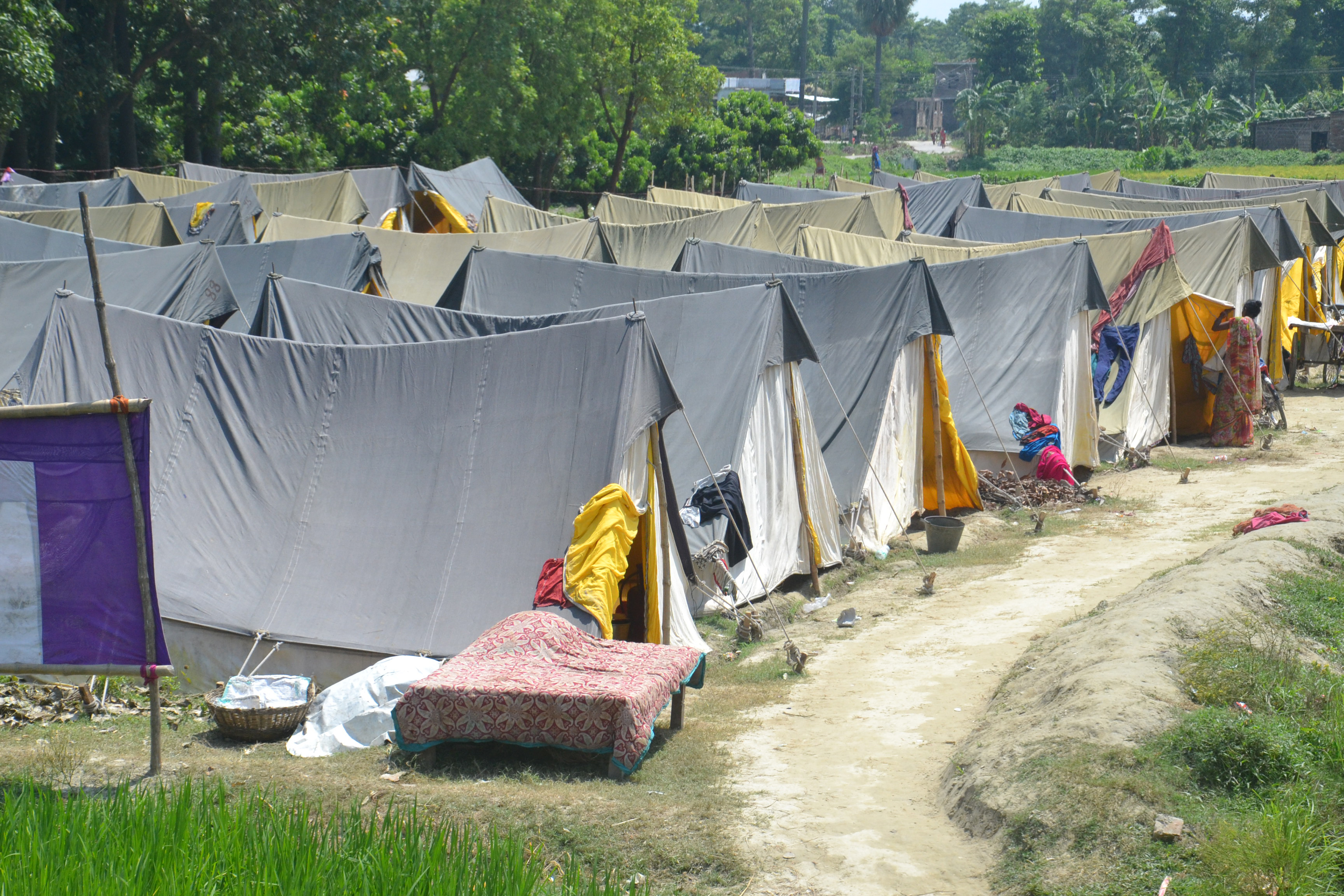 Even after the water begins to recede, many families continue to stay in the makeshift tents at the relief camps. Their houses have been destroyed and they have no other place to go to.