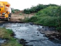 Faecal sludge gets illegally dumped in a water body.