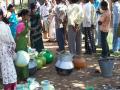 Queuing up for water (Source: IWP Flickr Photos)