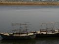 Navigating rivers through simple boats. (Source: IWP Flickr Photos)