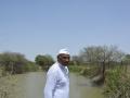 Vikram Patel near his farm pond in Chidavad.