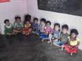 Children at an anganwadi centre, Mysore waiting for the mid-day meal
