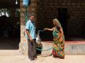 AKRSP has promoted rainwater harvesting to address the issue of scarce potable water at Mangrol. By encouraging households to collect rainwater using pipes on their roofs which then drain into an underground tank they have been able to promote water security. (Image: Aga Khan Foundation Flickr)