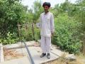 One of the Bhujal Jankaars measuring groundwater levels manually (Image: Basant Maheshwari)