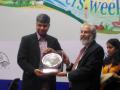 Ritwick Dutta (left) receives the Bhagirath Prayas Samman at India Rivers' Week.