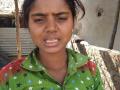 Village woman shows her fluorosis-affected teeth. (Pic courtesy: PSI)