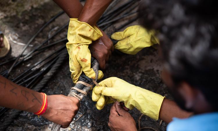 Despite the risks and the dire conditions of their work, sanitation workers continued to do their job (Image: C S Sharada Prasad, India Water Portal)