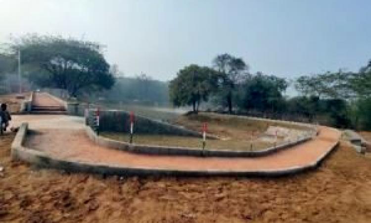 Walkway around pond, with solar lighting (Image: S M Sehgal Foundation)