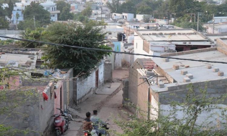 Need for legal framework for land rights in small and medium cities of Gujarat under PMAY (Image: Homes in the City)