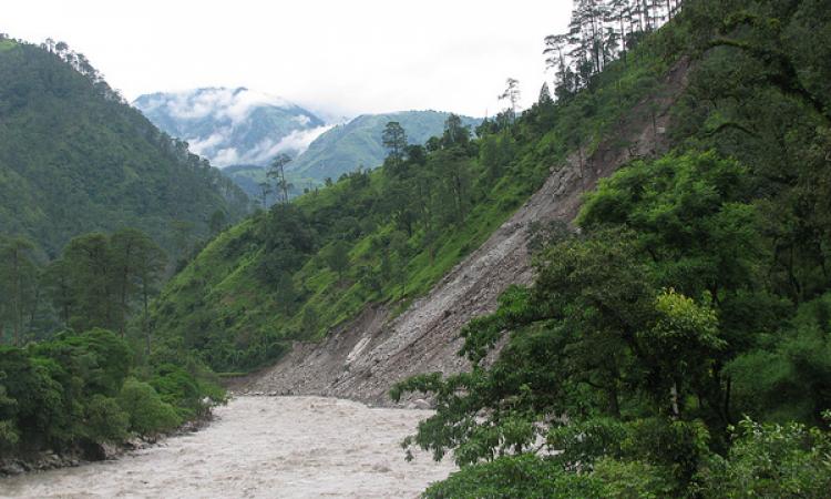 Landslide and a flooded river 