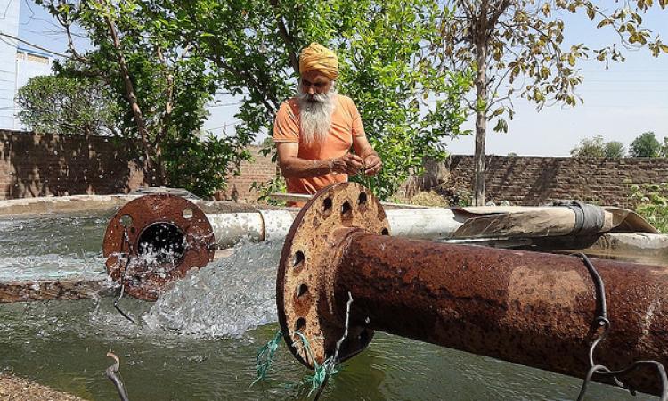 Billions of litres of groundwater pumped out every year contribute to carbon emissions. (Photo: IWP Flickr photos)