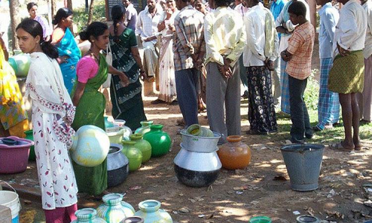 Queuing up for water (Source: IWP Flickr Photos)