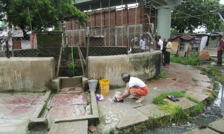 Open well in Hira mill ki chaal slum situated next to an open drain resulting in its water getting polluted.