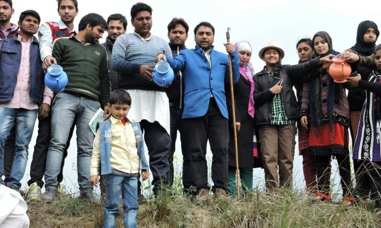 A “one house, one pot” symbolic water donation movement was conducted over the years for river Katha. (Image: Mustaquim Mallah)