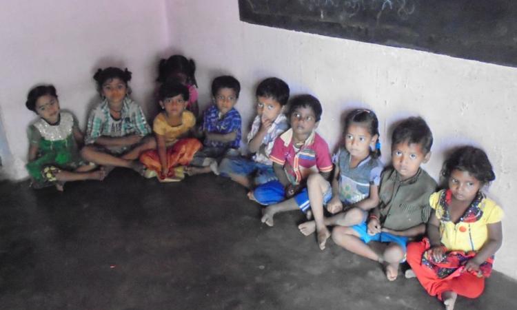 Children at an anganwadi centre, Mysore waiting for the mid-day meal