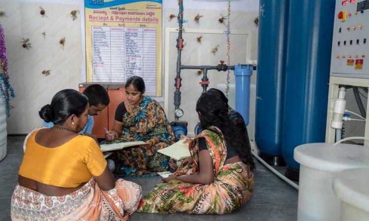 Owning, operating, and managing safe water supply through small water enterprises is a tangible way for women to transform their lives. (Image: Safe Water Network)